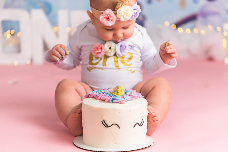 Baby smashing toes into cake in murrysville