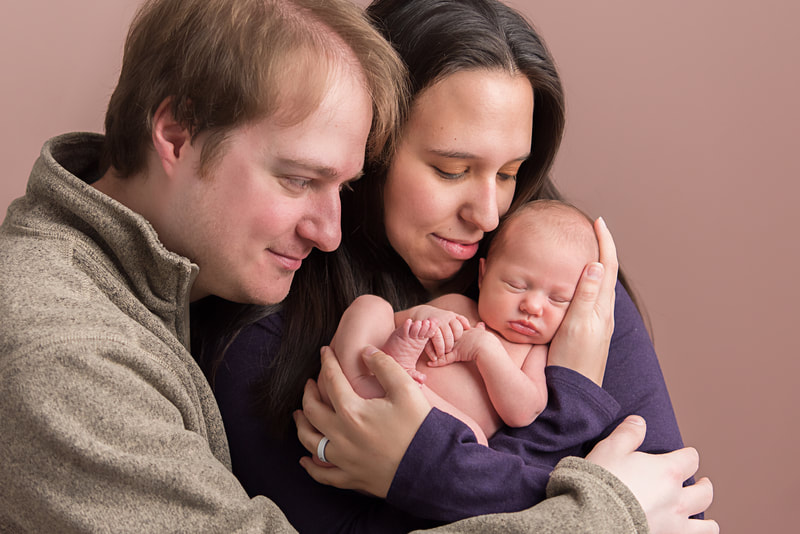 Family snuggling for Pittsburgh newborn session